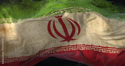 Old Iran Flag waving at wind. Loop photo