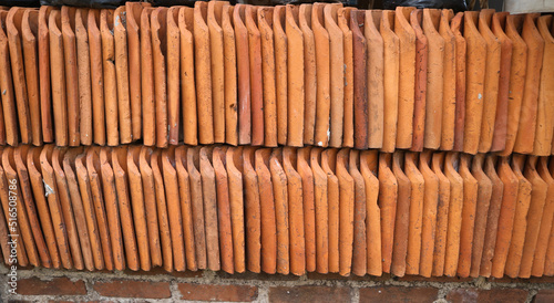 Rows and piles of tiles for the roof of the house neatly arranged