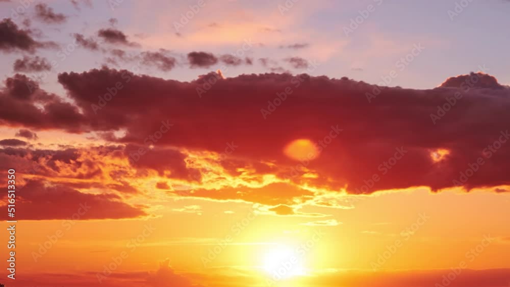 Evening sky with setting sun through clouds at sunset, cloudy landscape Evening sky with setting sun through clouds at sunset, cloudy landscape