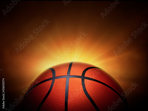 basketball ball. on black background with smoke, yellow orange red white colored back lights © Retouch man