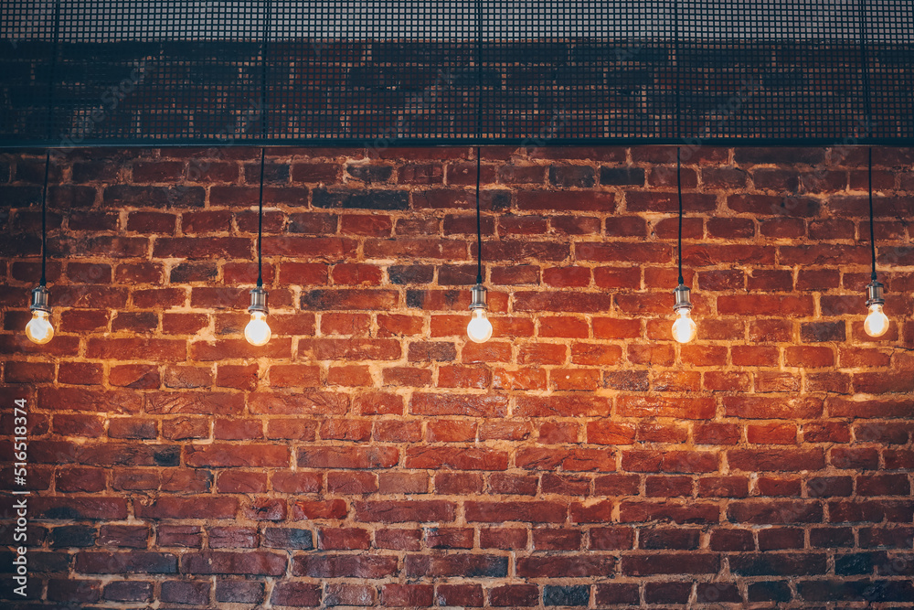 brick wall with bulb lights lamp. nice brick show room with spotlights. brick wall with bulb lights lamp. nice brick show room with spotlights.