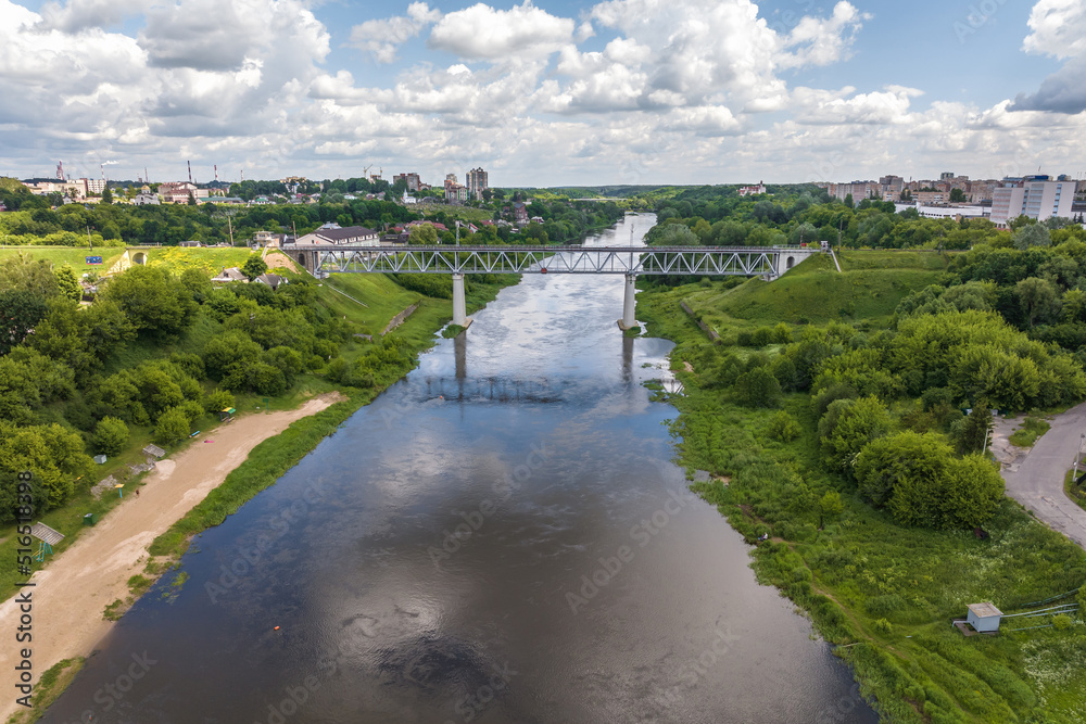 aerial view from great height on wide river and huge bridge of old city aerial view from great height on wide river and huge bridge of old city