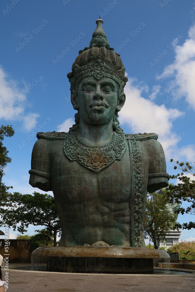 Obraz premium Garuda Wisnu Kencana Cultural Park (GWK). A popular place that has a statue as high as 122 meters, is called the GWK Statue. (Bali, Indonesia - June 18, 2022)