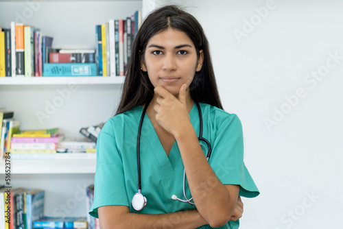 Serious south american female nurse or doctor