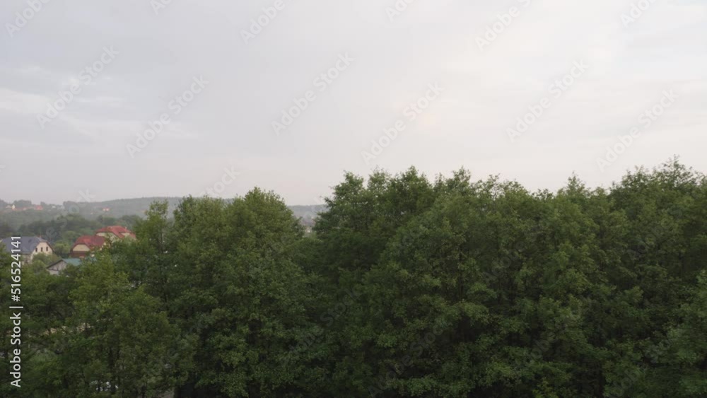 Gray clouds moving over Kolbudy village in pomeranian district. Gray clouds moving over Kolbudy village in pomeranian district.