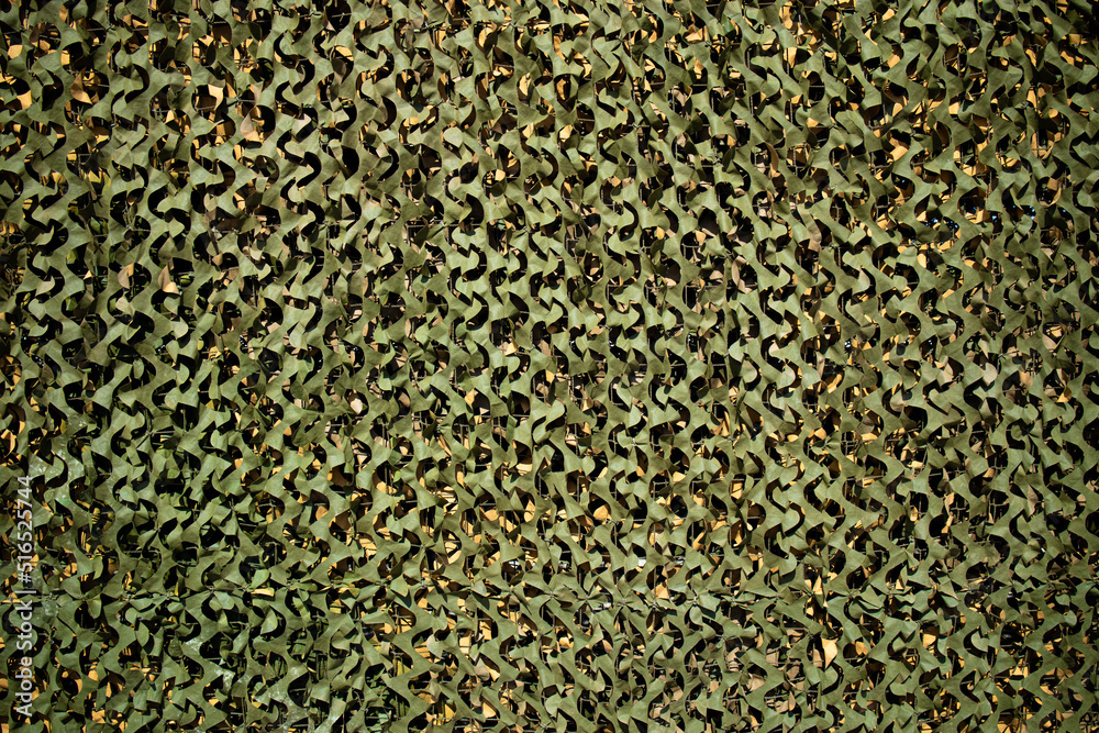 Camouflage textile cover pattern net used for military or hunting.