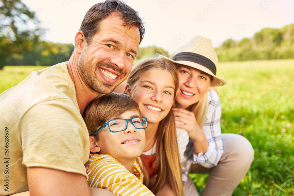 Family with two children in nature in summer Family with two children in nature in summer