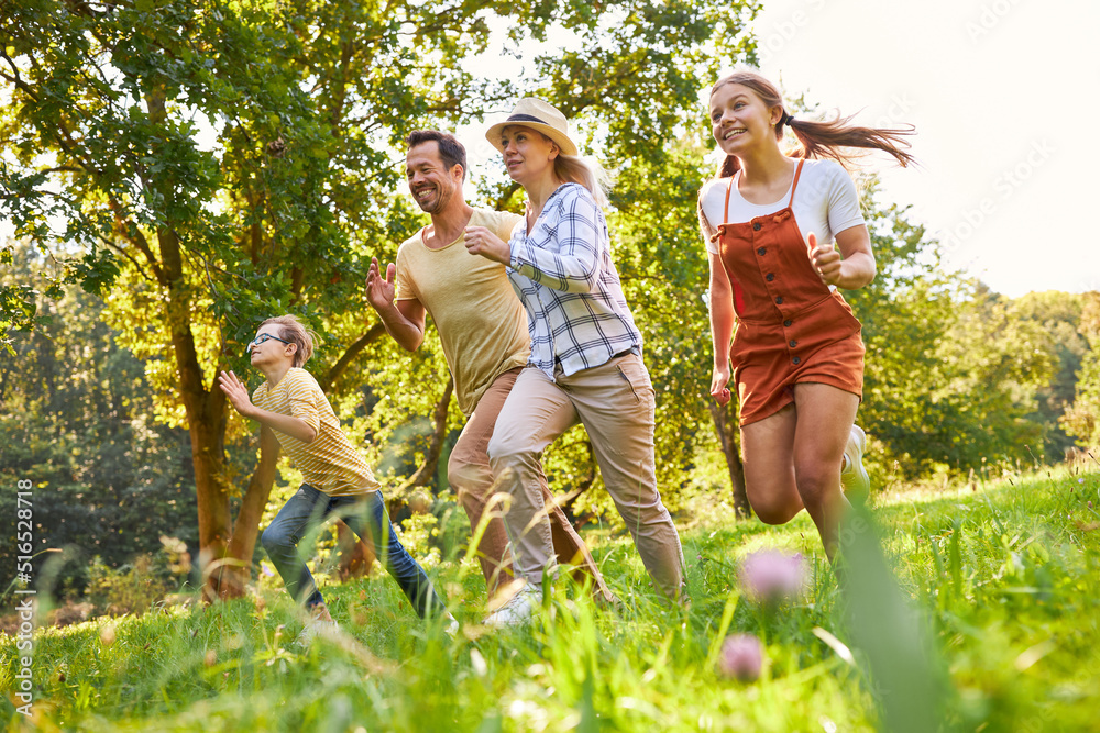 Sporty family with two children in a race