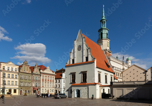 POZNAN, POLAND - MARCH 14, 2020: View of historic building of Weighing house and Town Hall in centre of Old Market Square in sunny spring day