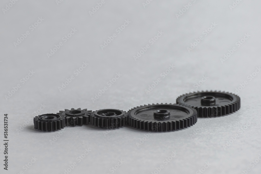 Serial connection of gears. Concept-relationship of economic processes. Teamwork, strategy, business idea. Economic integration