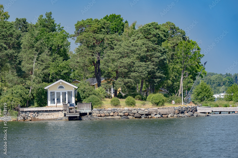 
Summertime view of houses on islands in the archipelago outside of Stockholm, the capital of Sweden, one of the Nordic countries along the Baltic Sea in Scandinavia, Europe. 