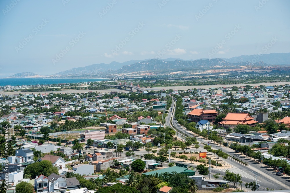 Obraz premium Landscape photo: panoramic view of Phan Rang coastal city from above.Time: June 20, 2022. Location: Phan Rang City.