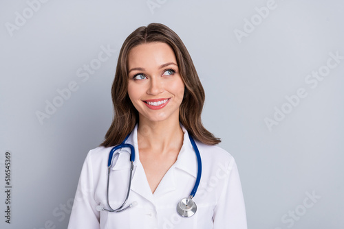 Photo of dreamy virologist lady look empty space recommend covid protect vaccine isolated grey color background