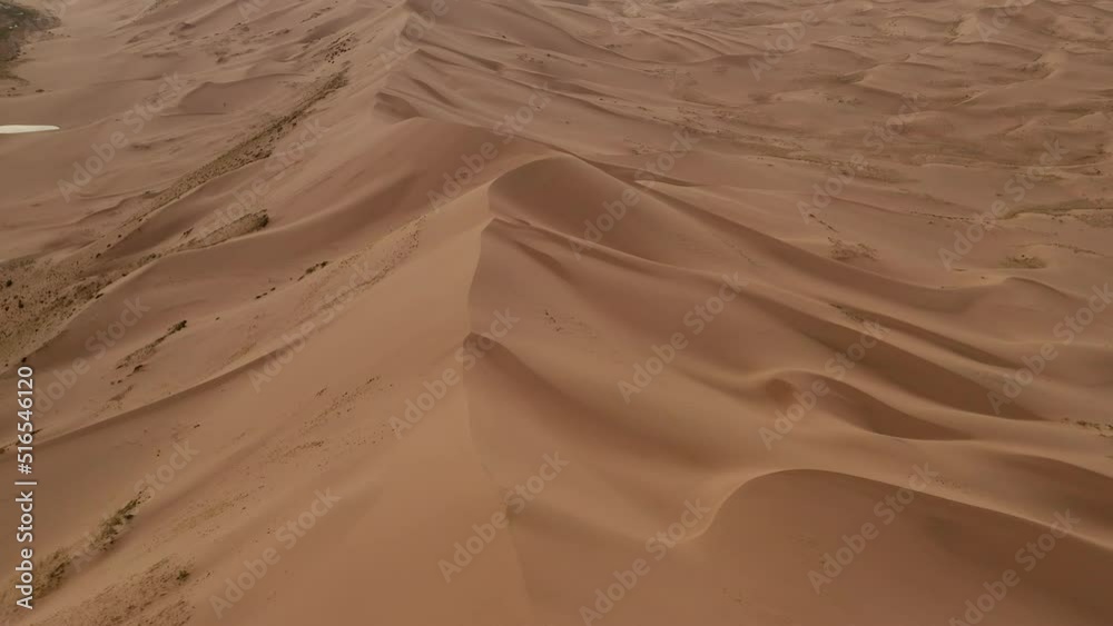Backward aerial view of goby desert sand dunes, mongolia Backward aerial view of goby desert sand dunes, mongolia