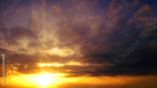 Fotografiet cute golden - blue sundown with dark clouds - abstract 3D illustration