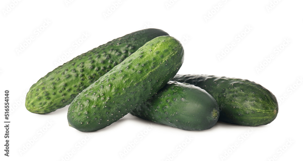 Whole fresh green cucumbers on white background Whole fresh green cucumbers on white background