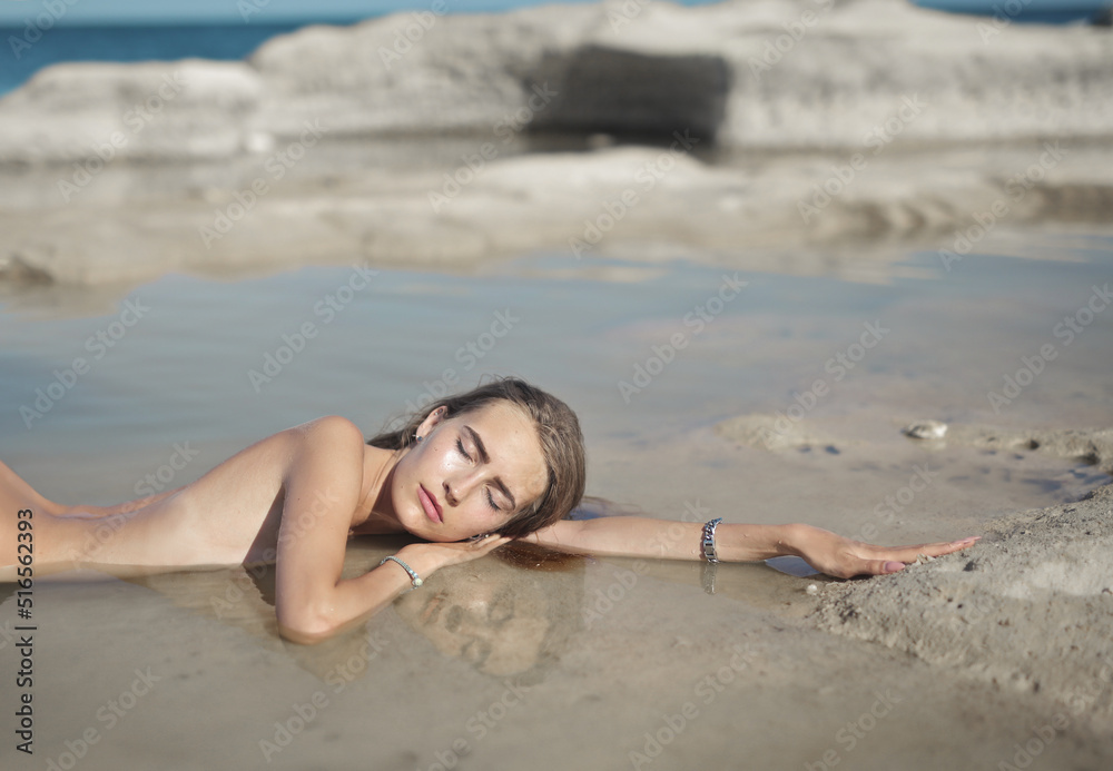 portrait of young woman immersed in the sea water portrait of young woman immersed in the sea water