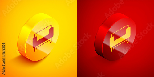 Isometric Sofa icon isolated on orange and red background. Circle button. Vector