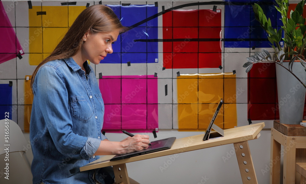 Woman designer working or learning at home deck, classroom with color palette Woman designer working or learning at home deck, classroom with color palette