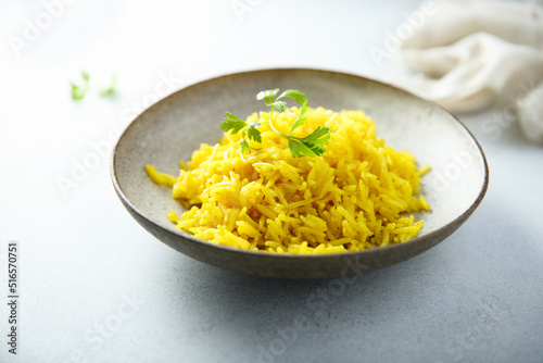 Healthy vegan turmeric rice with fresh parsley