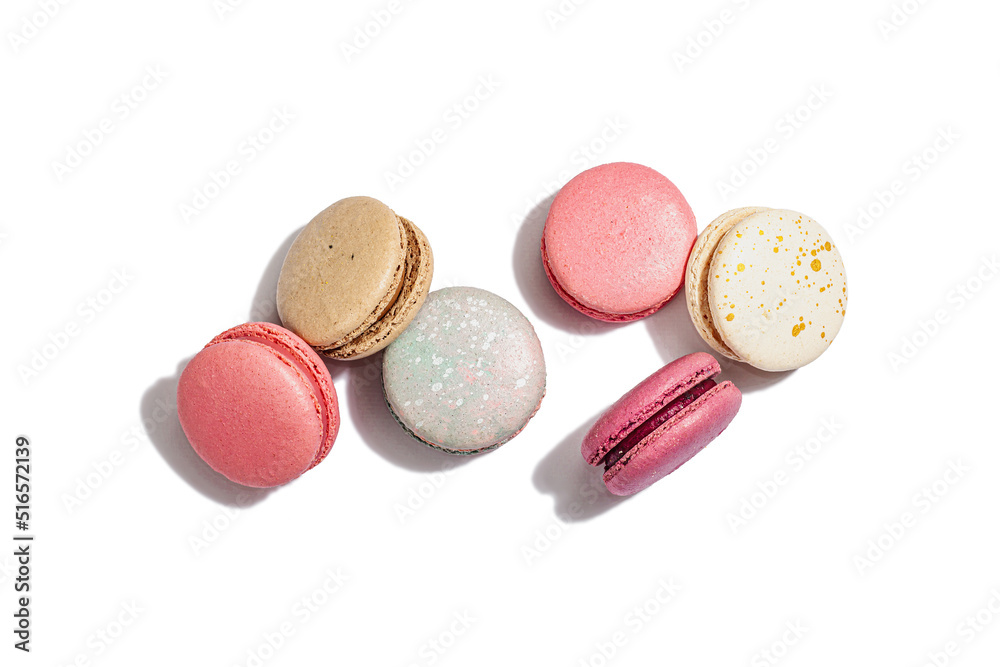 Different colorful French macarons isolated on white background. Culinary and cooking concept Different colorful French macarons isolated on white background. Culinary and cooking concept