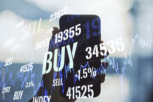 Multi exposure of abstract creative financial chart and hand with cell phone on background, research and analytics concept