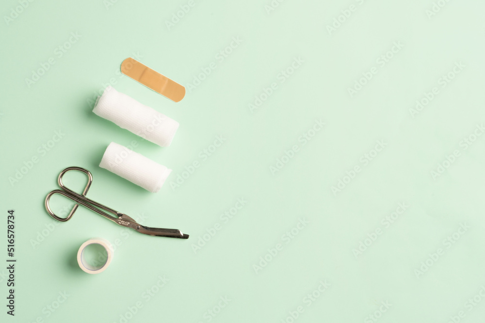 First aid kit, Medical bandages with scissors and sticking plaster. Medical equipment. First aid kit, Medical bandages with scissors and sticking plaster. Medical equipment.