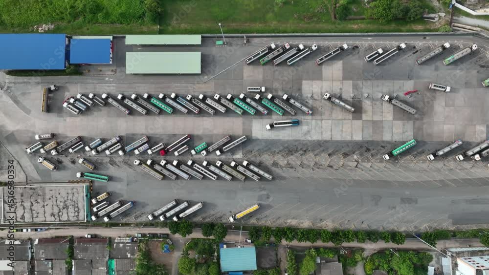 Aerial top view of Fuel Tanker Trucks at Truck Park in Oil Refinery
