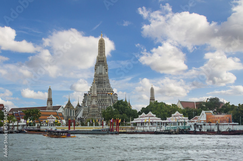 Scenic view of Wat Arun or Temple of Dawn. Tourists travel destination Wat Arun located in Bangkok on the west bank of the Chao Phraya river. © Itsanan