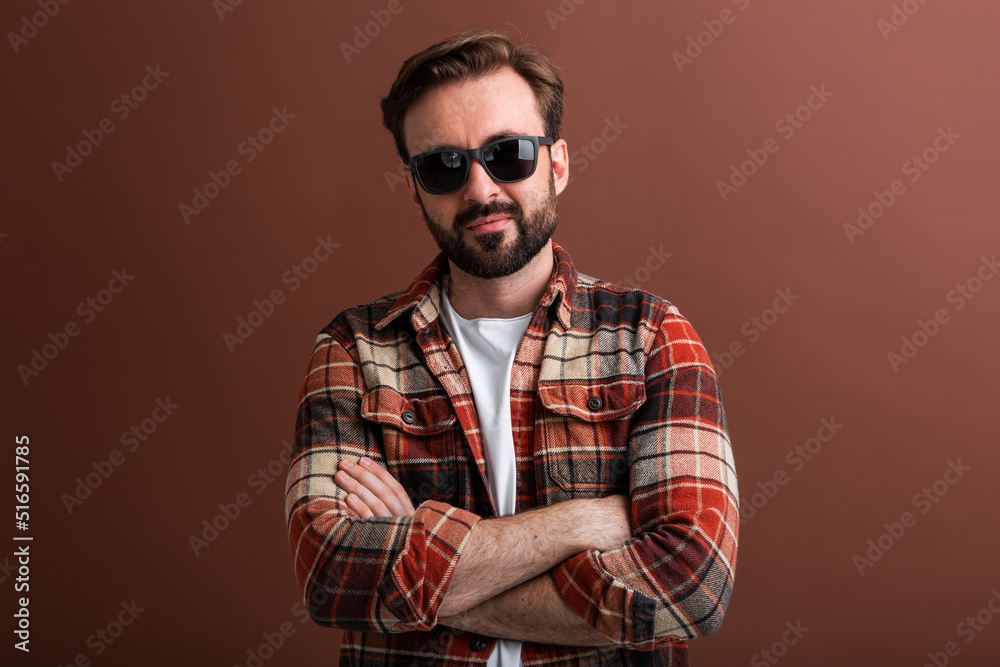 handsome man on brown background handsome man on brown background