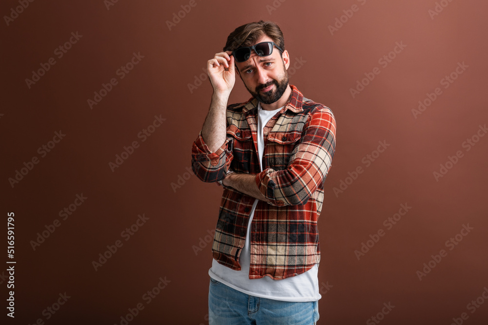 handsome man on brown background handsome man on brown background