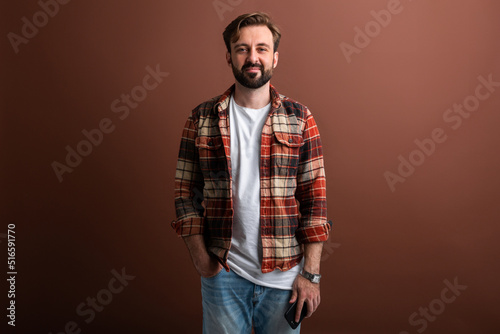 handsome man on brown background photo