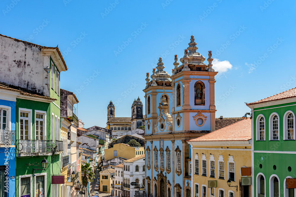 Facade of historic churches and colorful houses in the Pelourinho neighborhood in the city of Salvador in Bahia