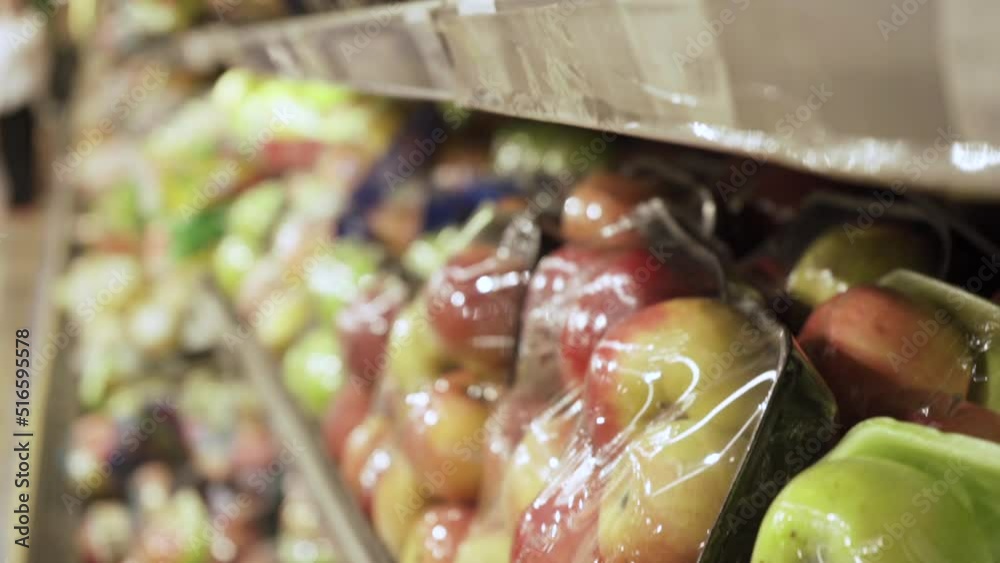Apples in plastic wrap. Apples in plastic wrap.
