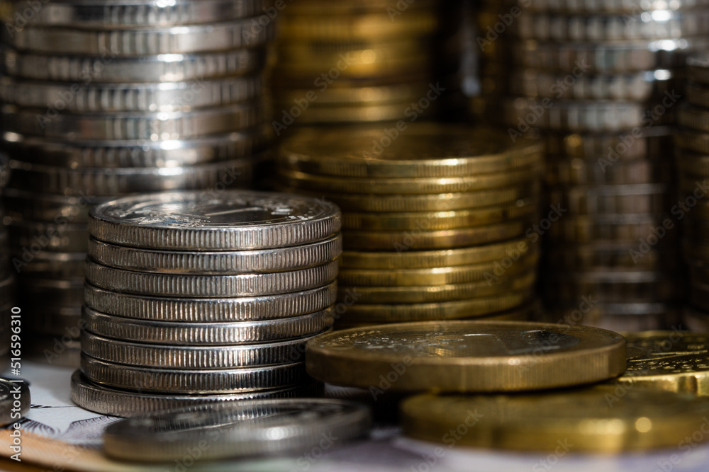 The coins are stacked in different combinations. Banking and money trading. The coins are stacked in different combinations. Banking and money trading.