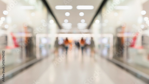 Abstract blur clothing boutique display interior of shopping mall background