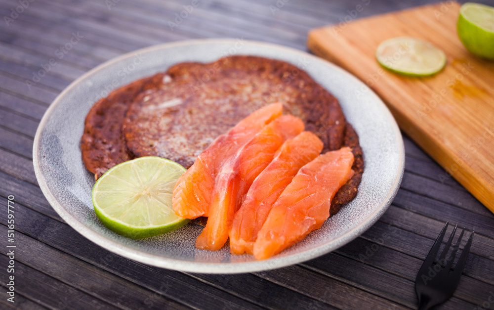 salted salmon fillet with buckwheat pancakes and lime salted salmon fillet with buckwheat pancakes and lime