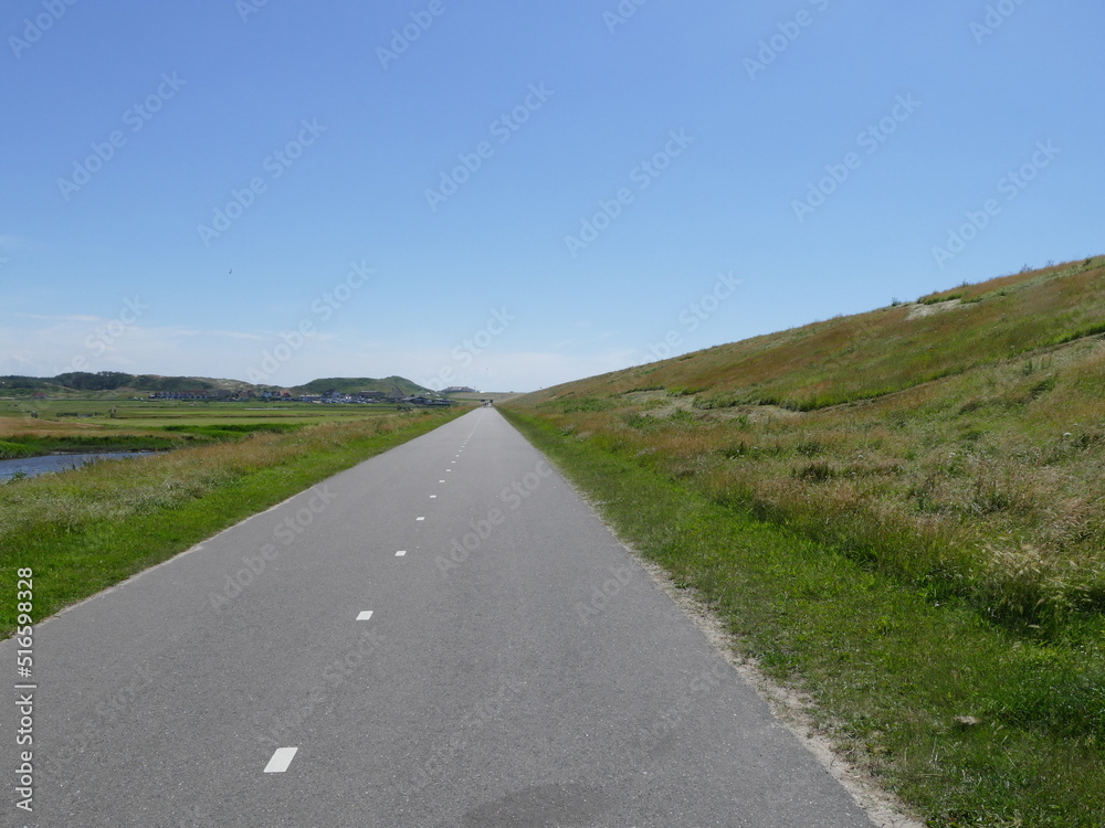 Road behind the dike near Petten, North Holland, Holland, Netherlands