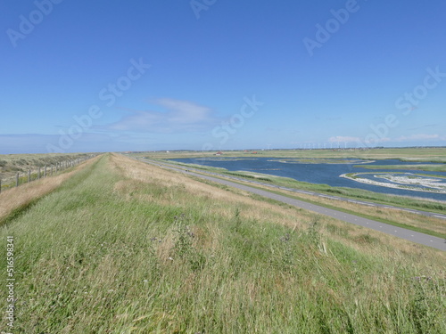 The "Hondsbossche Zeevering" - dyke near Petten, North Holland, Holland, Netherlands, right a bird breeding lagoon
