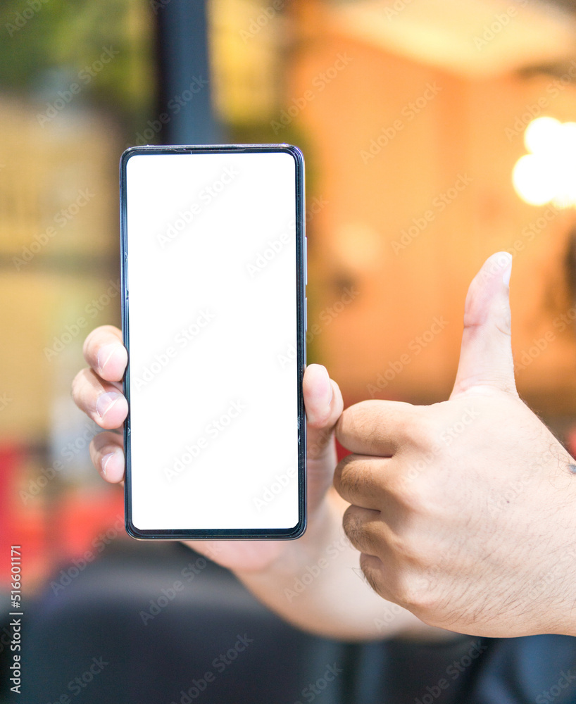 man thumbs up mobile phone with blank white screen