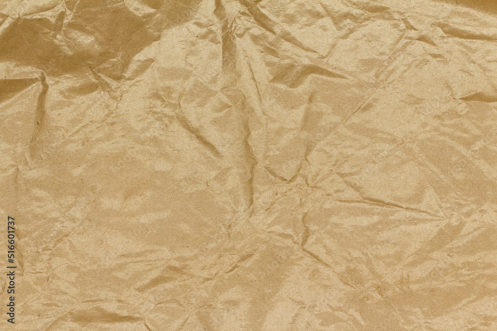 Obraz premium Beige paper texture. Abstract background. Smooth brown wrapping kraft paper. Copy space for text
