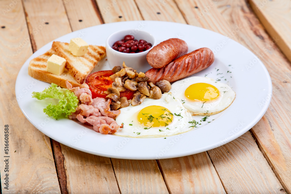 breakfast with sausage and toasts