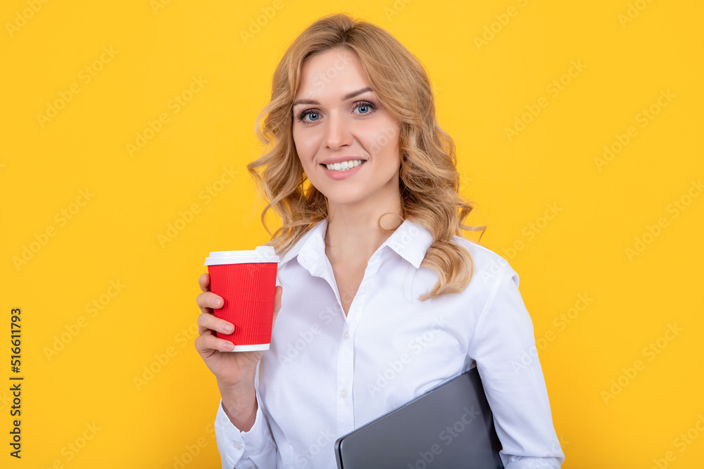 cheerful blonde woman with coffee cup and pc on yellow background cheerful blonde woman with coffee cup and pc on yellow background