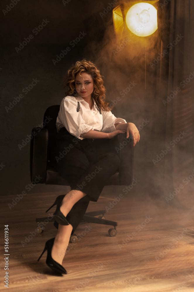 girl sitting in a chair girl sitting in a chair