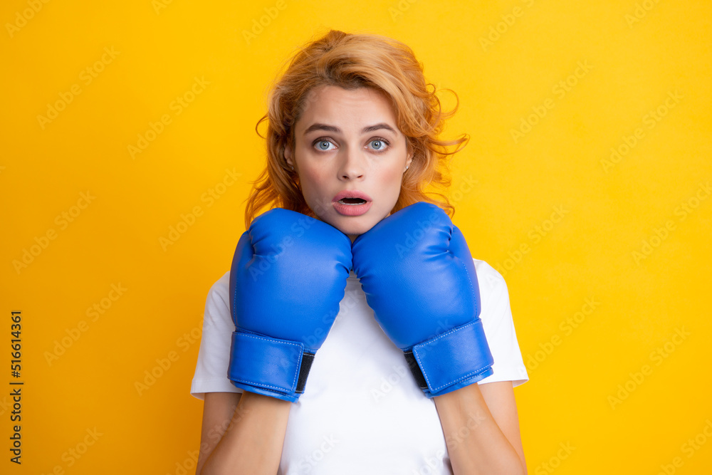 Woman in boxing gloves. Surprised female boxer. Woman in boxing gloves. Surprised female boxer.