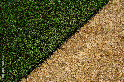 Fototapeta Naklejka Na Ścianę i Meble -  sports field where the turf meets the dirt 1