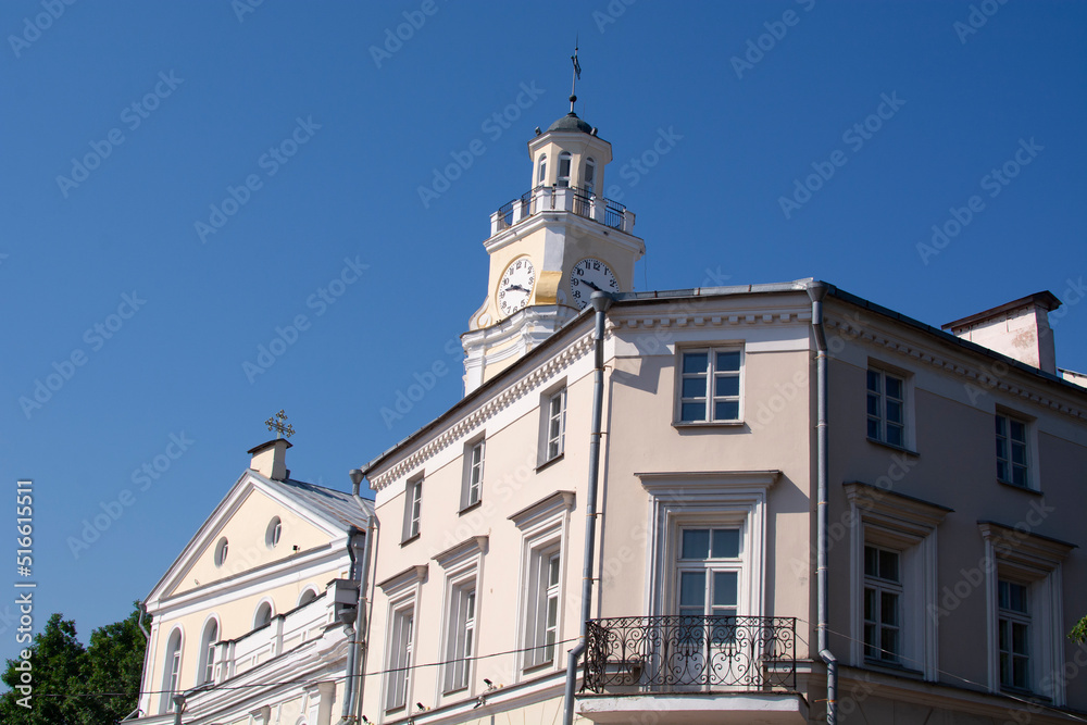 Old Town Hall in Vitebsk, Belarus. City Hall, Clock Tower Is Famous Landmark In Sunny Day On Blue Sky Background