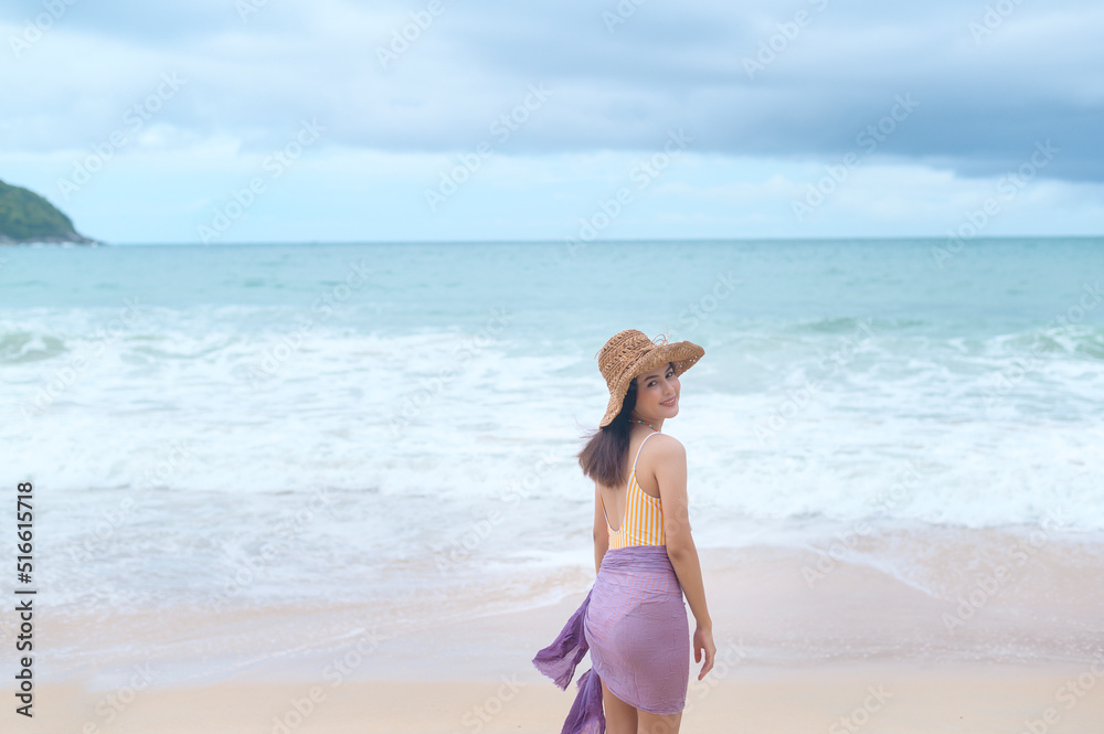Young Beautiful woman in Bikini enjoying and relaxing on the beach, Summer, vacation, holidays, Lifestyles concept. Young Beautiful woman in Bikini enjoying and relaxing on the beach, Summer, vacation, holidays, Lifestyles concept.