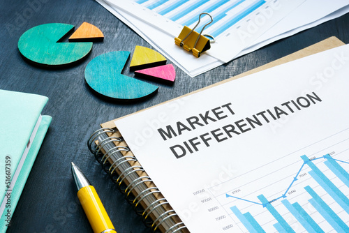 Report about market differentiation with charts and graphs. photo
