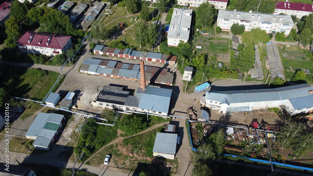 Fototapeta premium Summer photo of a green village from quadrocopter